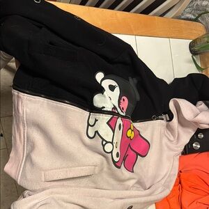 Black and Pink Zip-Up Hoodie with Cartoon Graphic